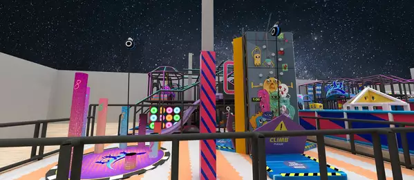 The climbing wall and multi-level play structure
